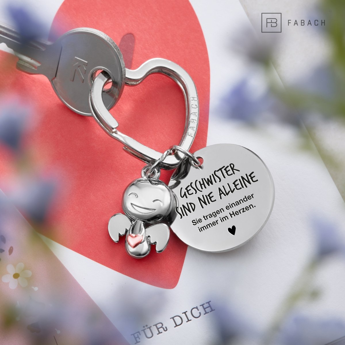 "Beste Schwester" Schutzengel Schlüsselanhänger - Schutzengel Happy mit Herz und Gravur Plättchen mit liebevoller Botschaft